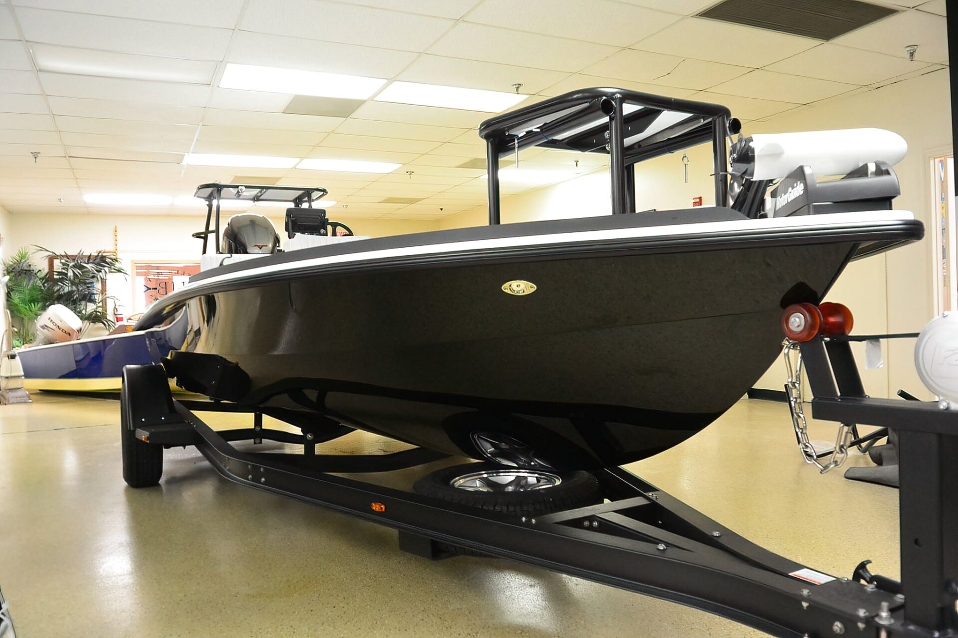 HB Marquesa skiff on a Ram-Lin trailer the optional blackout package.