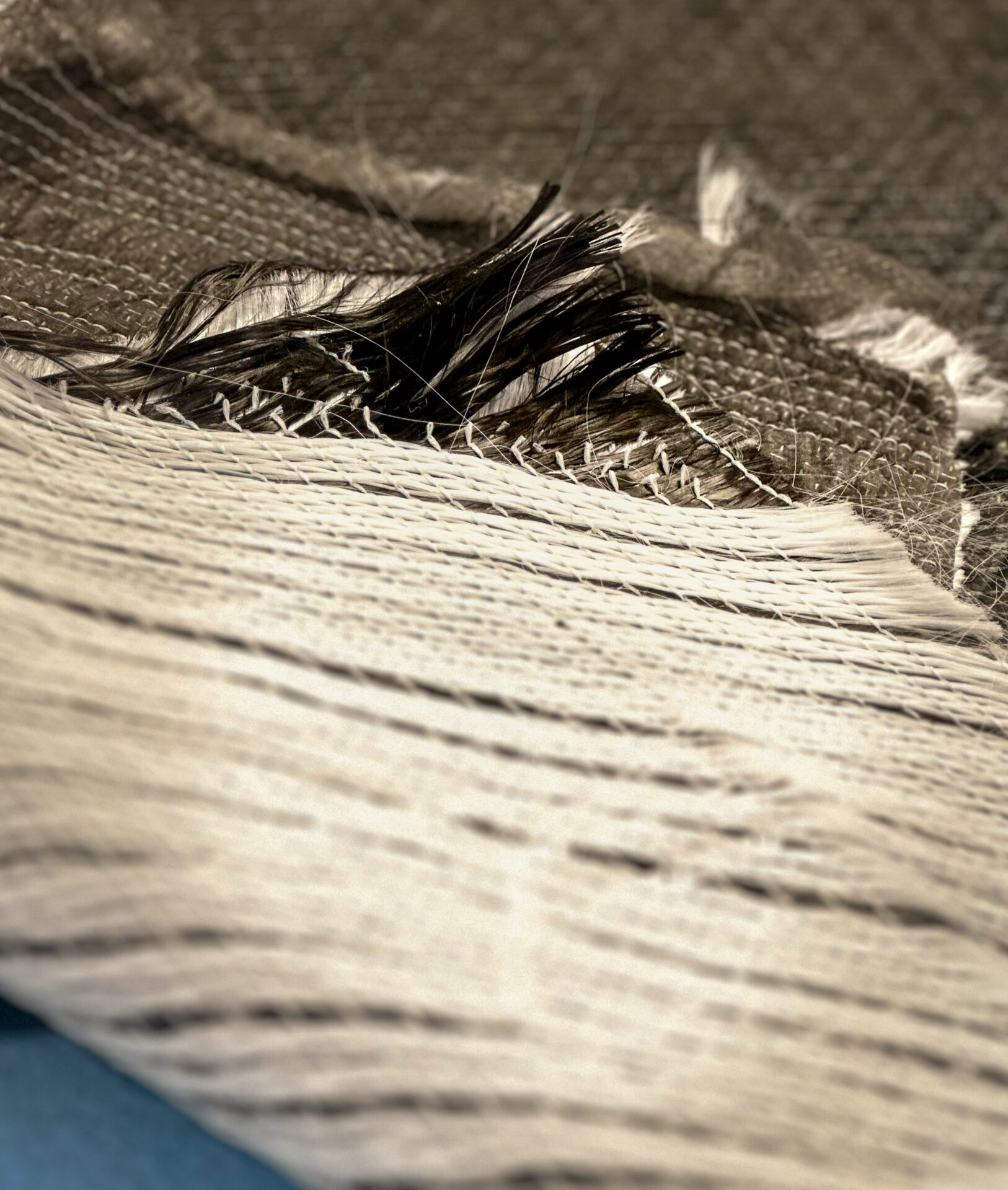 Sample of carbon innegra fibers used the Hell's Bay hull