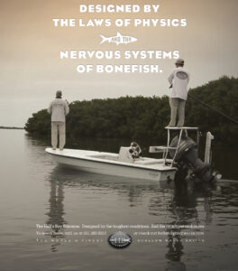 Flats skiff poling in shallow water