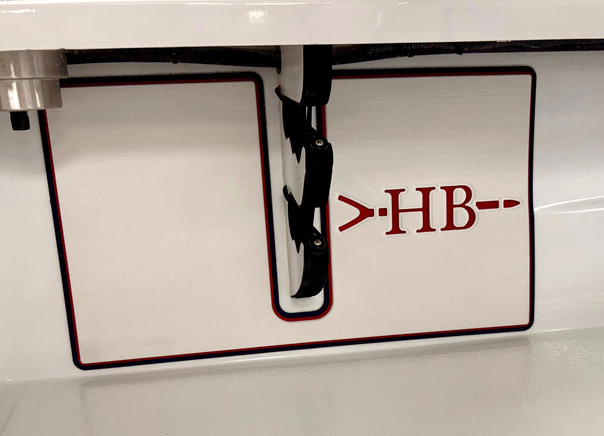 Hell’s Bay marine EVA foam reel pads with red HB logo accent